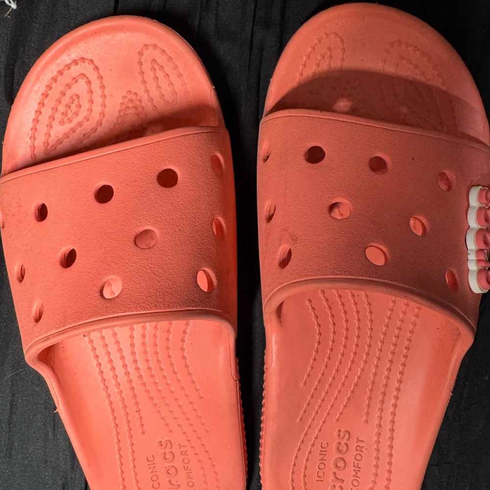 orange croc slides.